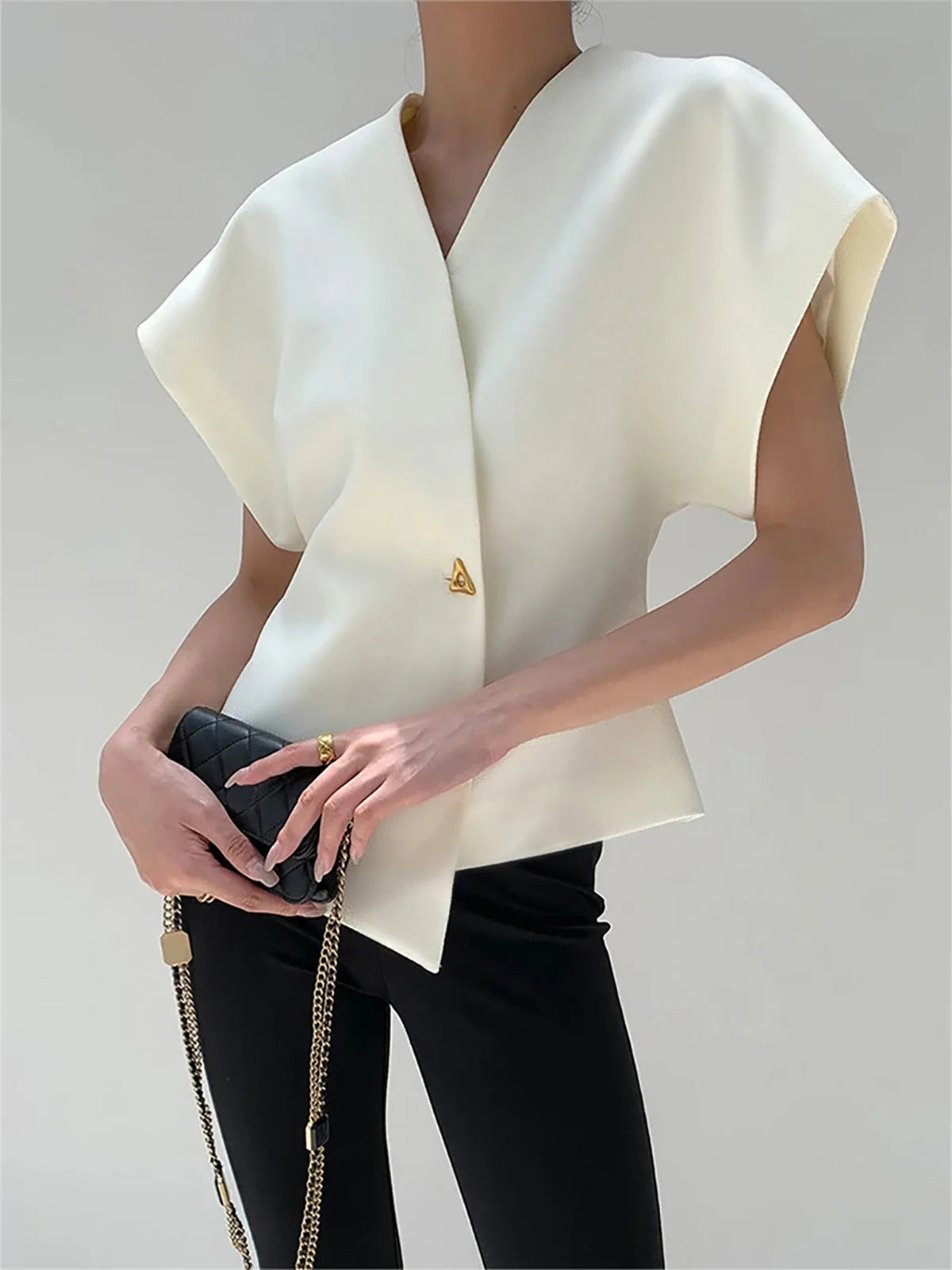 Kaia Asymmetric Top