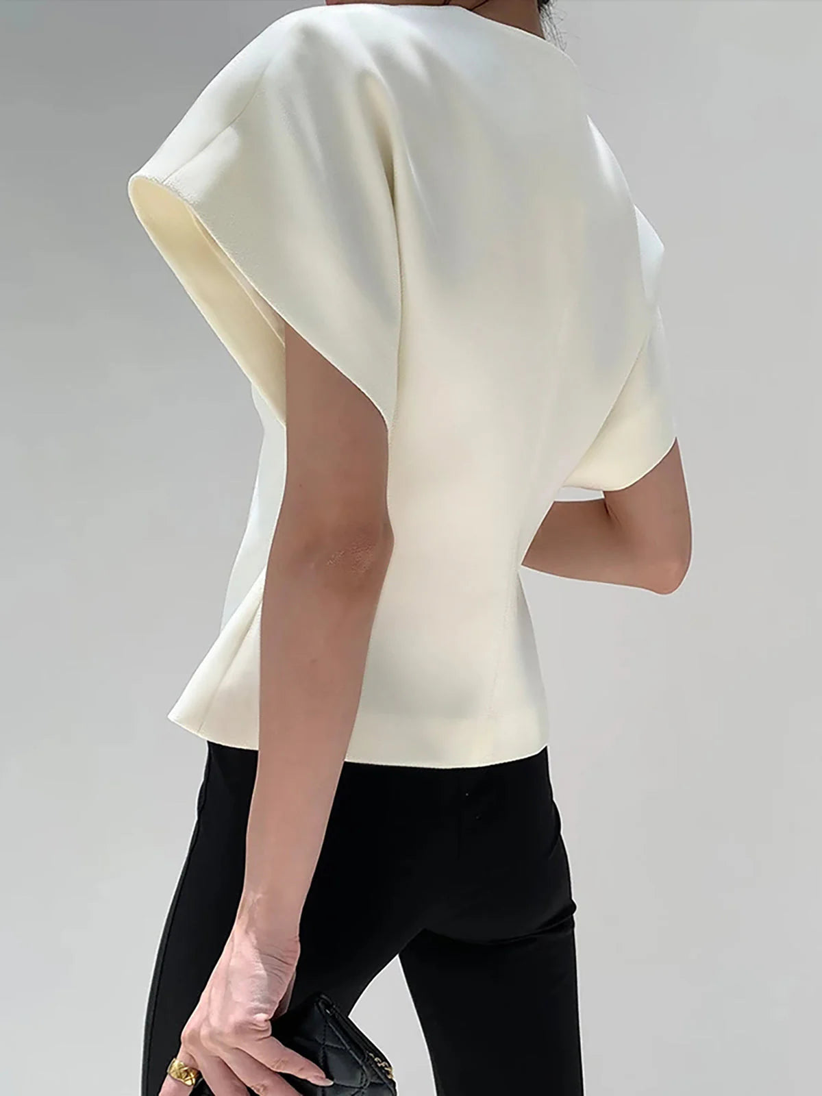 Kaia Asymmetric Top